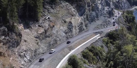 Aerial view of Highway 4 at Kennedy Hill, with several cars and evidence of construction