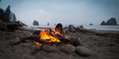 Close up photography of bonfire on beach sand