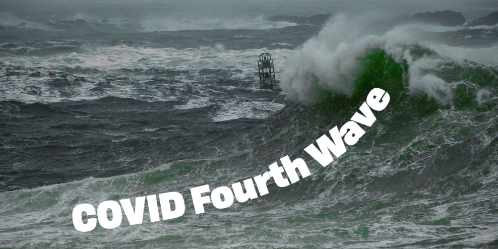 Waves crash on a stormy day while a buoy bobs around.